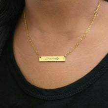 Load image into Gallery viewer, Gold necklace with engraved name on a person wearing a black shirt