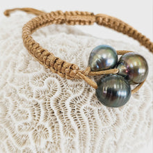 Load image into Gallery viewer, Pearl trio bracelet with coral background
