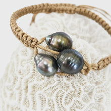 Load image into Gallery viewer, Pearl trio bracelet with coral background
