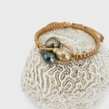 Load image into Gallery viewer, Pearl trio bracelet with coral background
