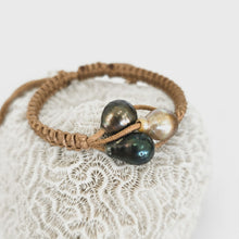 Load image into Gallery viewer, Pearl trio bracelet with coral background
