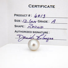 Load image into Gallery viewer, Pearl with a certification card indicating product number, size, grade, and shape.
