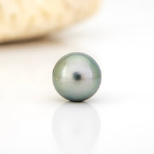 Load image into Gallery viewer, Single pearl on a white background
