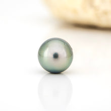 Load image into Gallery viewer, Single pearl on a white background

