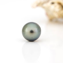 Load image into Gallery viewer, Single pearl on a white background
