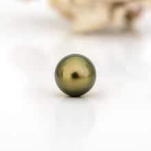 Load image into Gallery viewer, Single pearl on a white background
