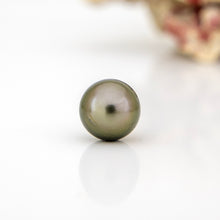 Load image into Gallery viewer, Single pearl on a white background
