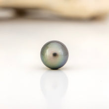 Load image into Gallery viewer, Single pearl on a white background
