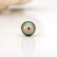 Load image into Gallery viewer, Single pearl on a white background
