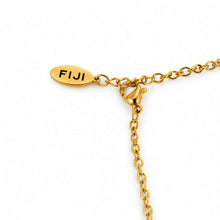 Load image into Gallery viewer, Close-up of a gold chain necklace with an oval FIJI tag and lobster clasp on a white background.

