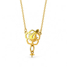 Load image into Gallery viewer, A gold-toned necklace featuring a cutout floral pendant with pearl setting, shown against a plain white background.
