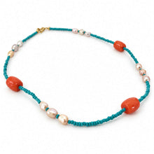 Load image into Gallery viewer, A beaded necklace featuring turquoise blue cord, large orange-red coral-like beads, and irregular white pearls, displayed on a clean white background.
