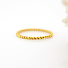Load image into Gallery viewer, Gold twisted ring on a white background
