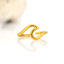 Load image into Gallery viewer, Gold wave-shaped ring on a white background
