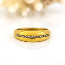 Load image into Gallery viewer, Gold ring with small stones on a white background
